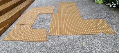 Overlocked carpet edge showing durable stitched finish